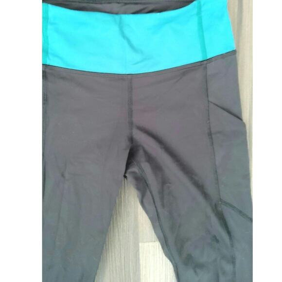 Lululemon leggings speed up lights out black teal eyelet lzip pocket side size 4 - Picture 3 of 6